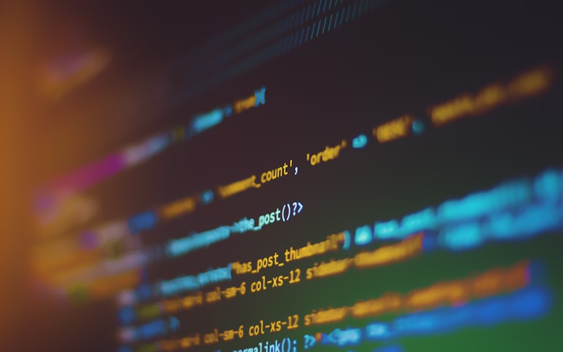 Code on a dark screen representing cybersecurity and secure systems